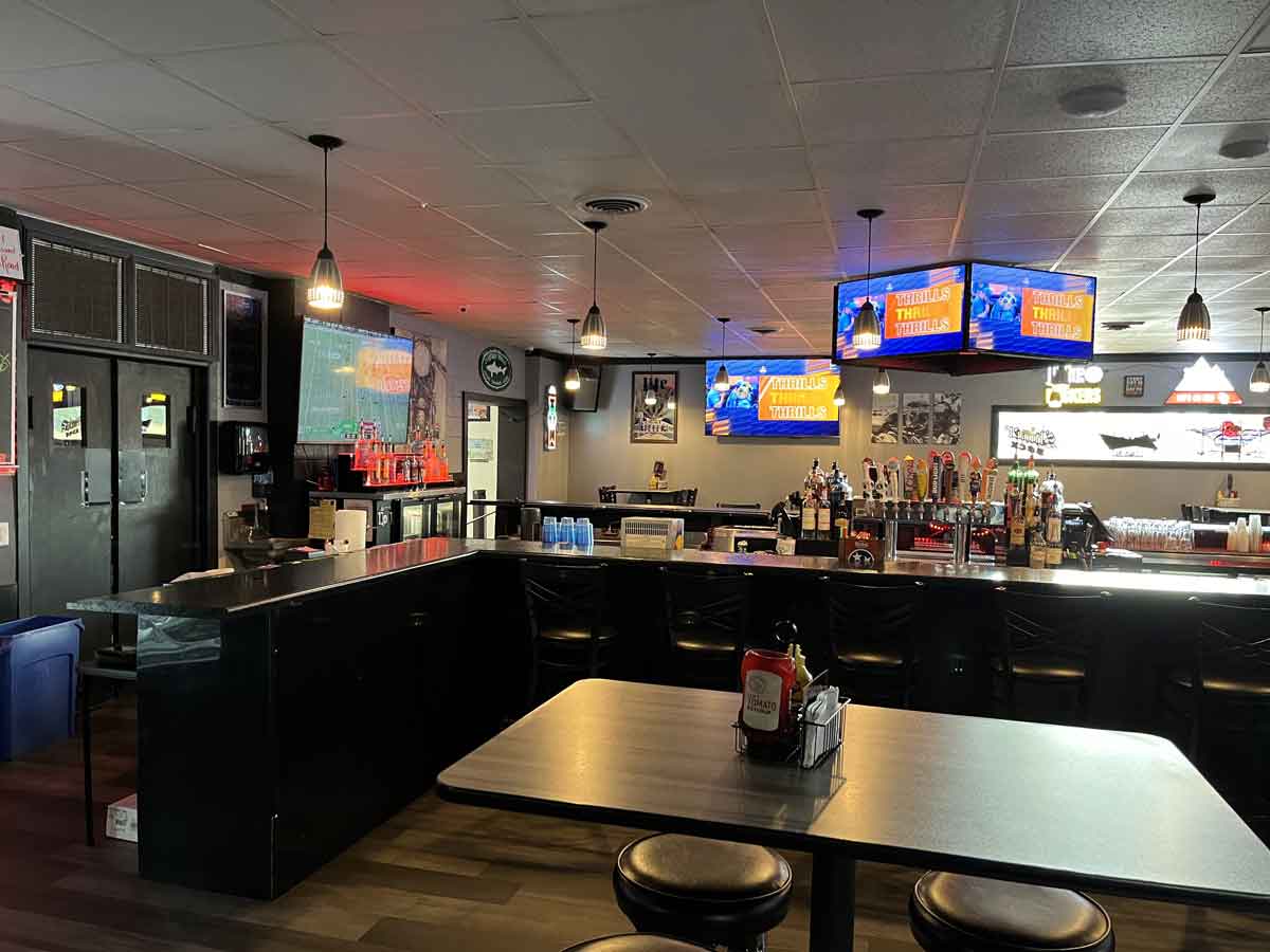 The bar and seating available at Ryders Roadhouse in Wisconsin Rapids, WI