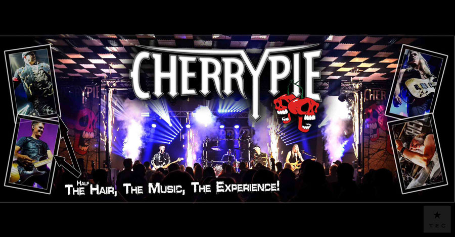 Ryders Roadhouse in Wisconsin Rapids Wisconsin Rock band CHERRYPiE performs on stage with guitars, lights, and smoke, surrounded by fans.